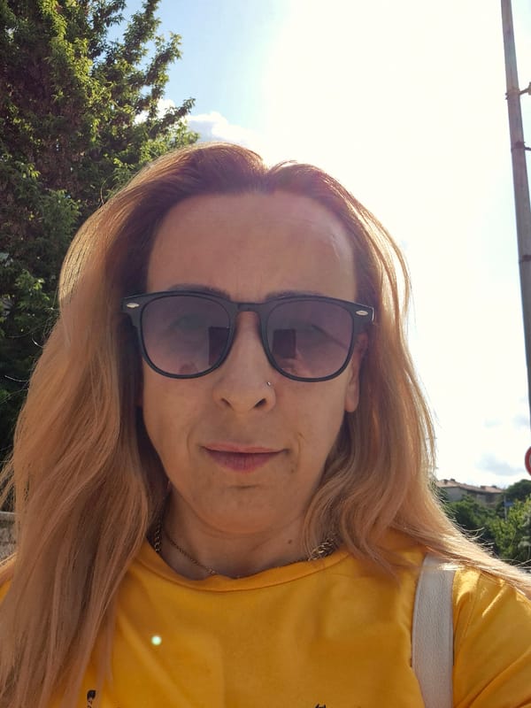 Woman documents sunny afternoon walk with selfies and flower photography