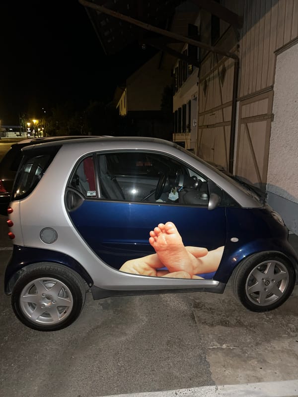 Smart car with foot graphic spotted in Uster, Switzerland