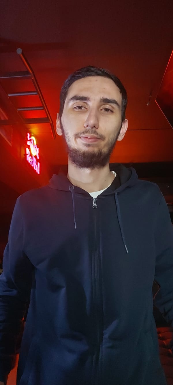 Man documented gaming setup in early morning Tashkent session