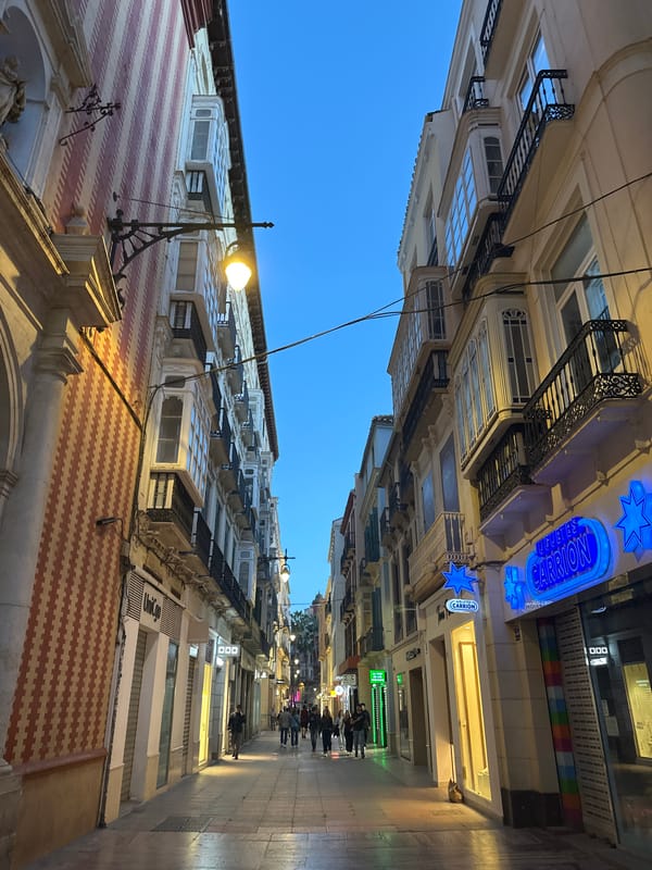 Street scene documented in historic Málaga neighborhood