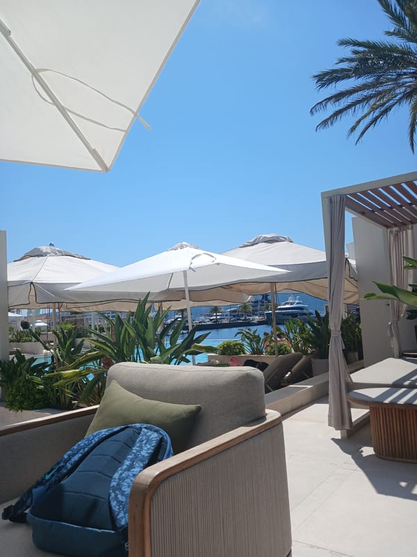 Poolside sushi and selfies at a marina-view venue
