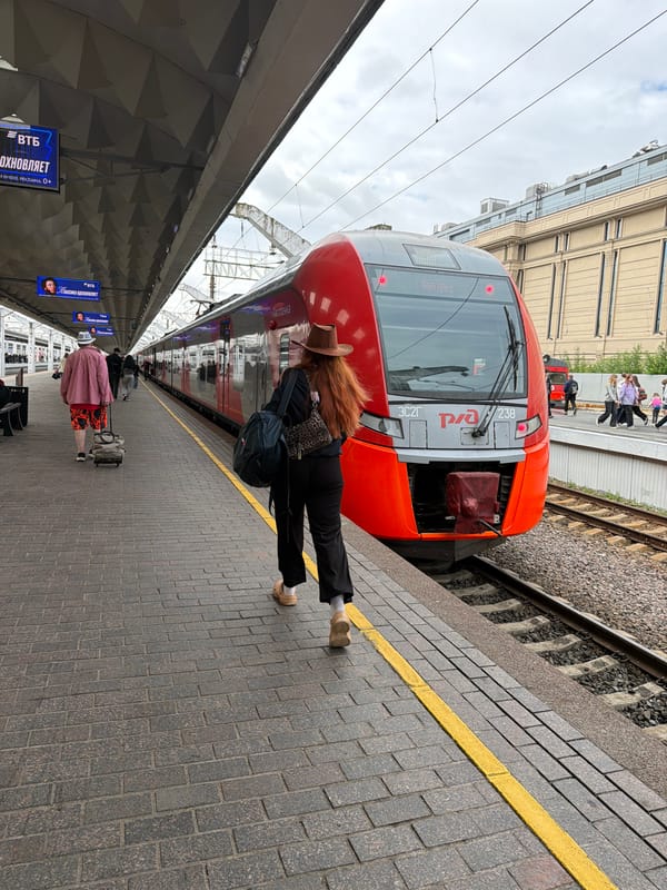 RZD trains at a Saint Petersburg station, June morning
