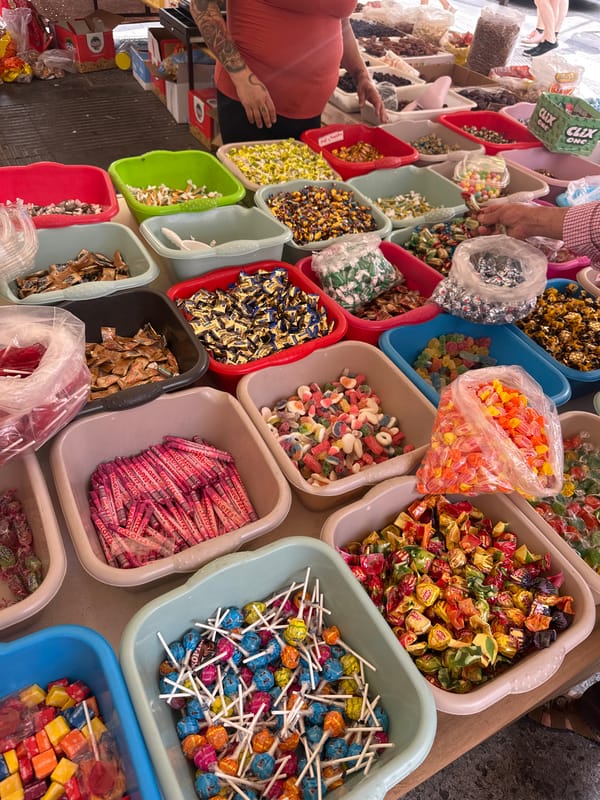 Morning market bustling with vendors and shoppers captured