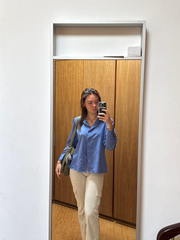 Woman takes mirror selfie in Mexican home