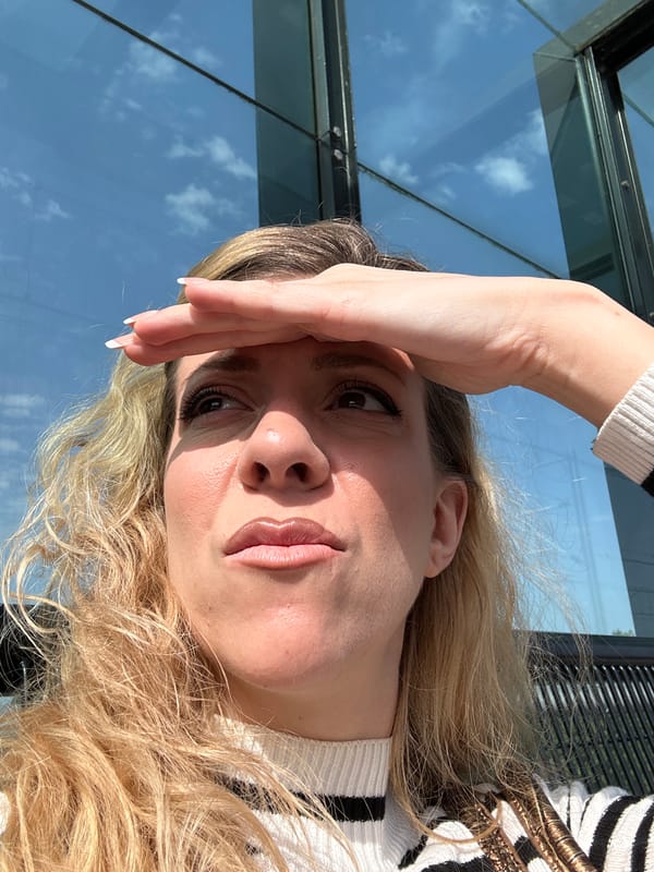 Woman documents afternoon scenes at Dutch train station