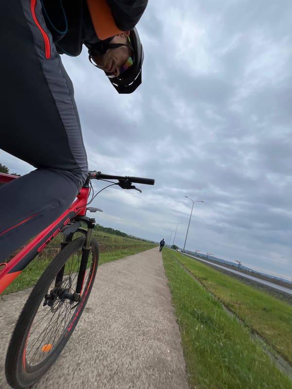 Cyclist spotted on paved path in Chaikovsky, Russia