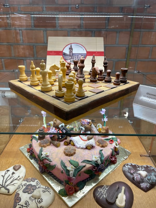 Tourist documents museum exhibits and Brandenburg Gate in Kaliningrad