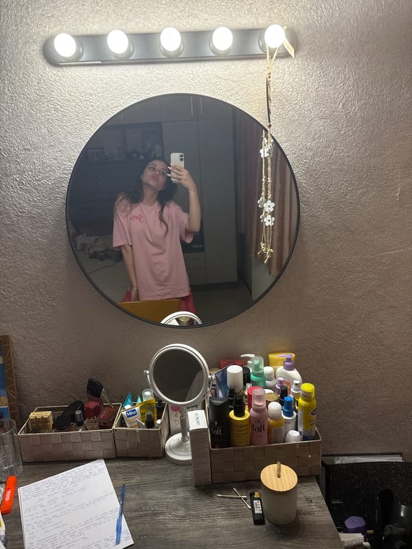 Woman takes selfies in mirrors in Bulgarovo, Bulgaria