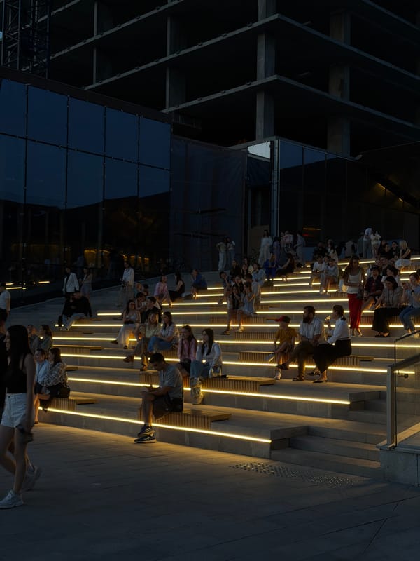Evening gathering on illuminated steps in Kazan draws crowds