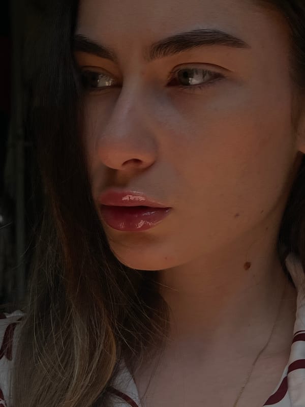 Woman captures multiple selfies and portraits in 11-minute session