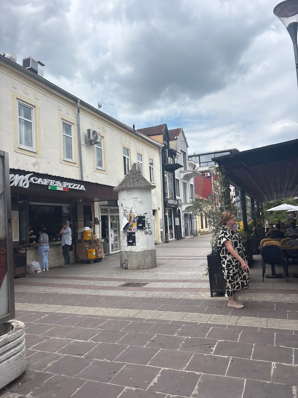 Overcast morning on Podgorica's pedestrian cafe street captured