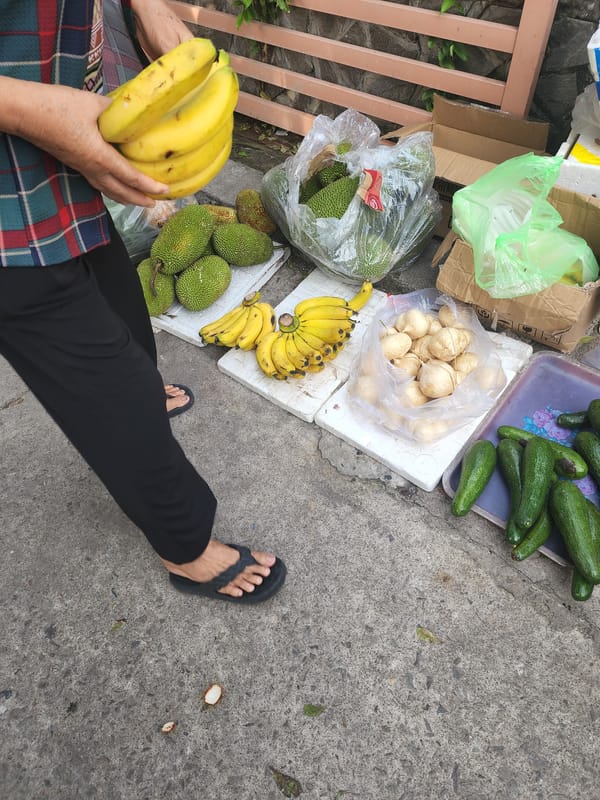 Early morning street market activity documented in Vietnamese ward