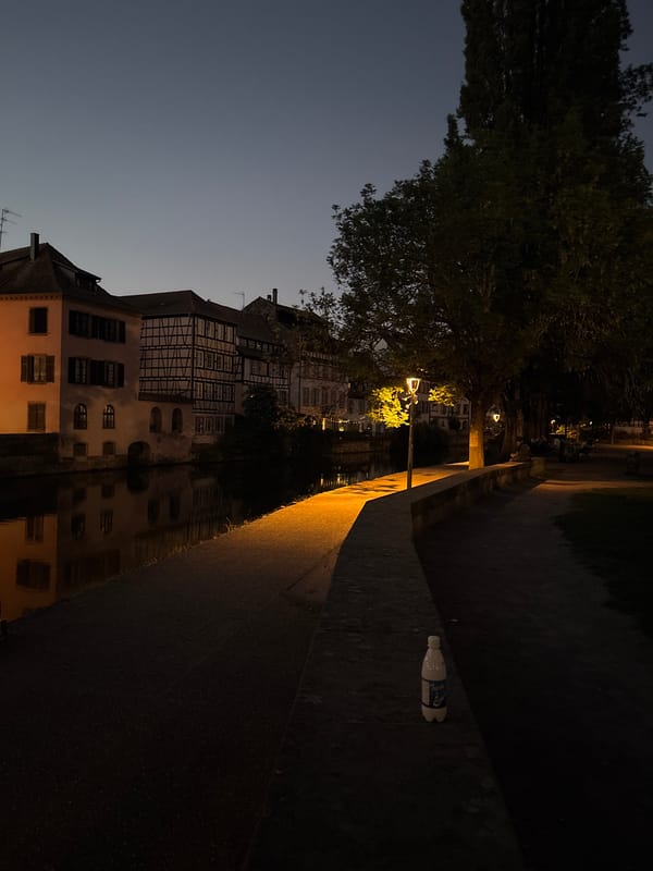 Evening stroll documented through Strasbourg's illuminated historic canals