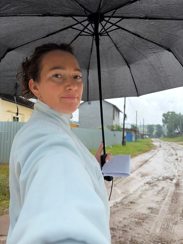 Rainy day selfie on a muddy road in rural Olkhovka