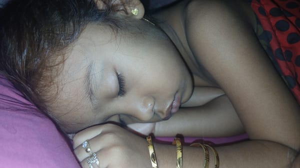 Child sleeping in gold jewelry, Keudejungkagajah, Indonesia