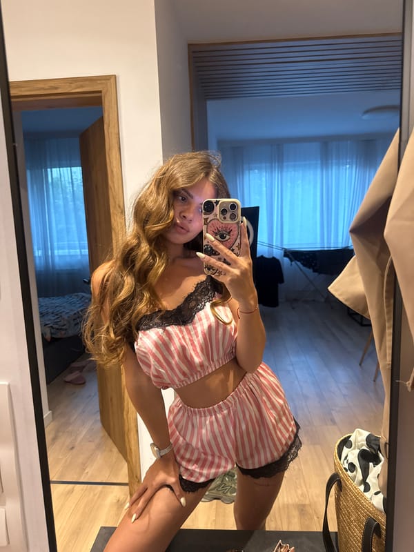 Mirror selfie series in Plovdiv bedroom, pink striped pajama set