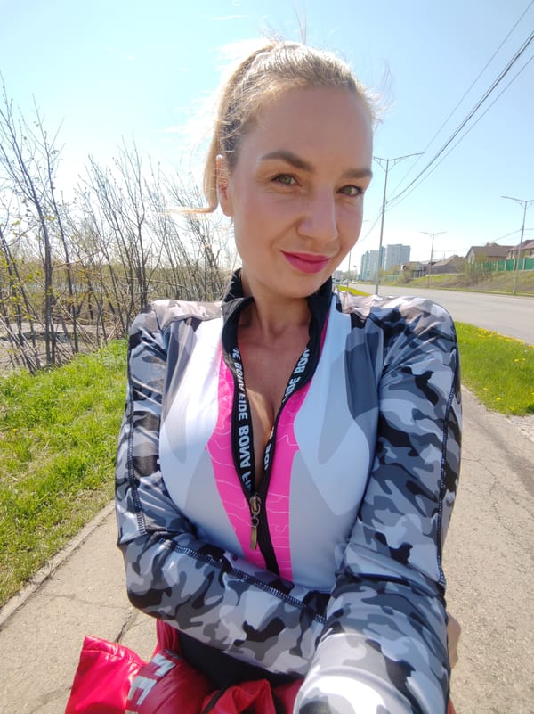 Woman documents outdoor selfie session in Petropavlovsk-Kamchatsky, Russia