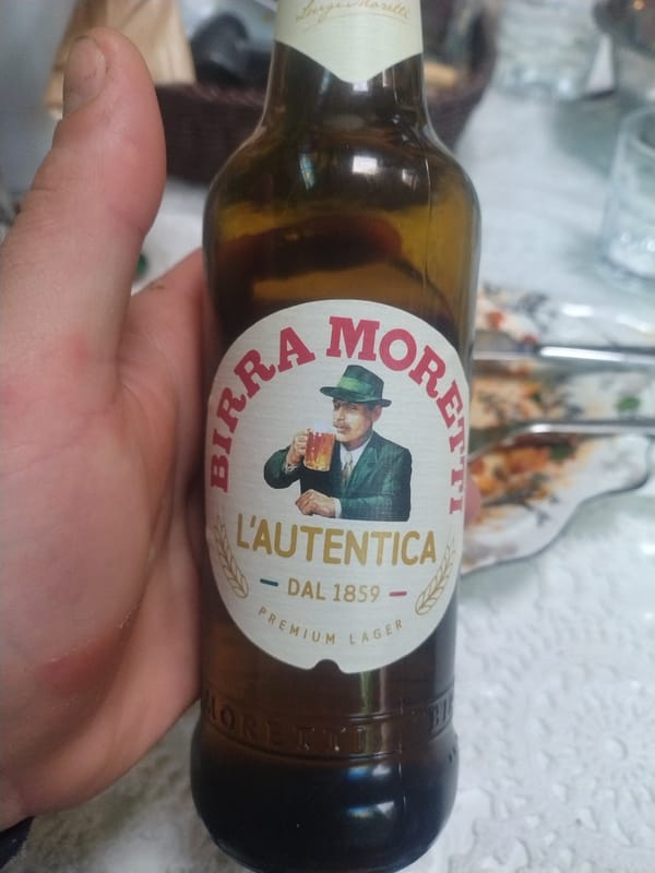 Dining experience features lasagna and decorative fruit in Luxembourg