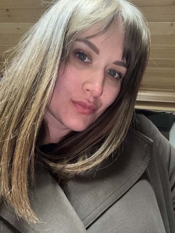Woman takes selfie in residential Chaikovsky, Russia