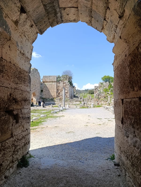 Tourist visits ancient Perga ruins in Turkey morning