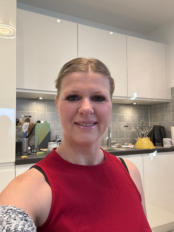 Woman takes smiling selfie in Marche-en-Famenne, Belgium