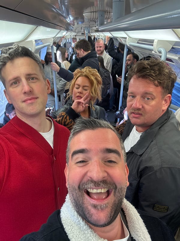 Commuters photographed on crowded London Underground train during evening rush