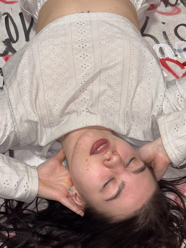 Young woman photographed with kitten in casual moments, Perm