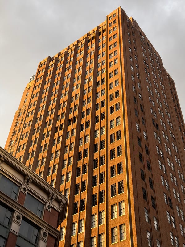 Brick building photographed from street level in NYC