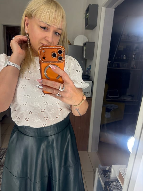 Woman takes mirror selfies in Chaikovsky, Russia early morning
