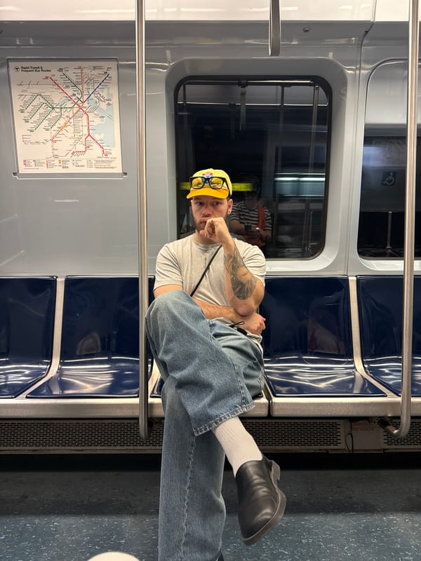 Man aboard Boston subway train during evening commute