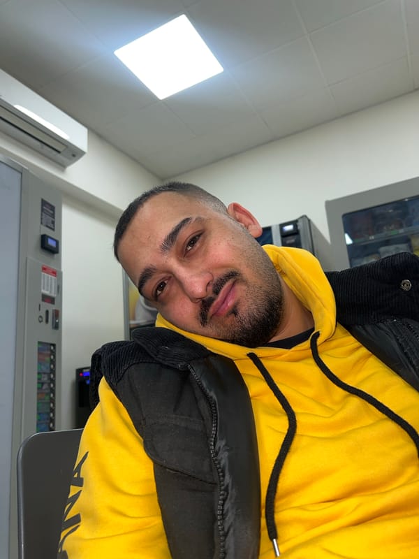 Man in yellow hoodie spotted indoors in Sevlievo, Bulgaria