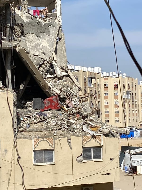 Building collapse damages apartment structure in Khan Yunis