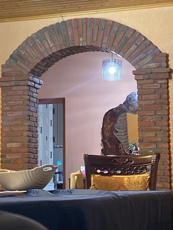 UNO game and a casual meal in a rustic interior space.