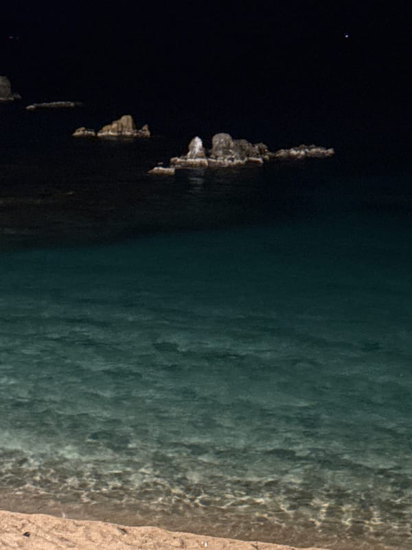 Nighttime coastal scenes captured in Blanes, Spain waterfront