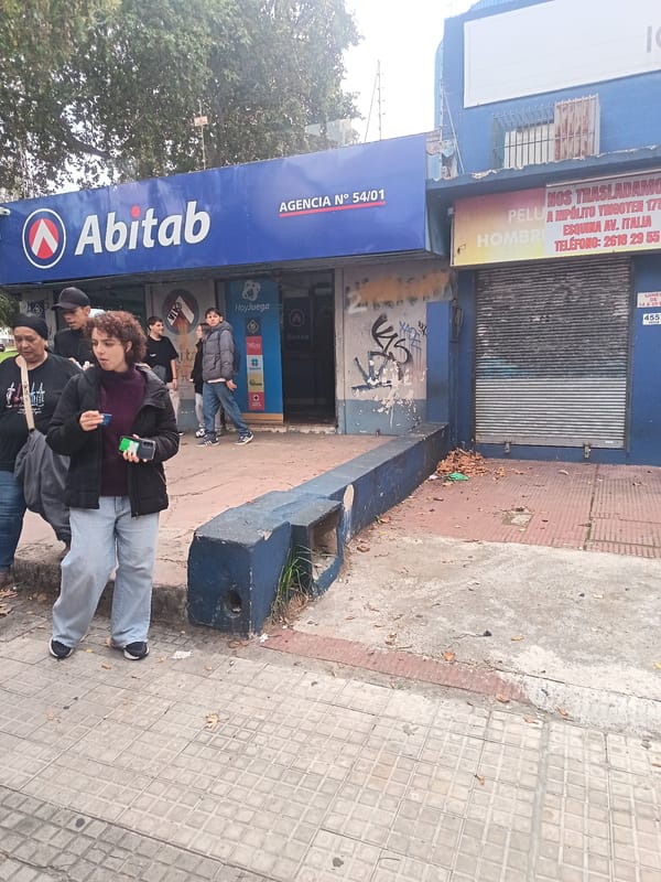 Montevideo street scenes documented: Abitab branch, residential buildings