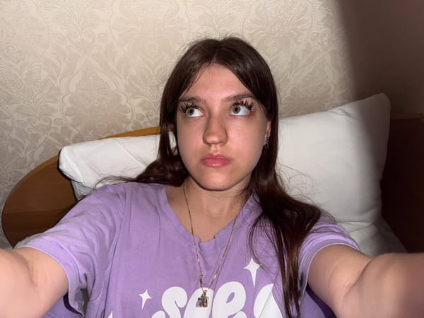 Bed selfies, chip bag, and sticker sheet on a chill evening