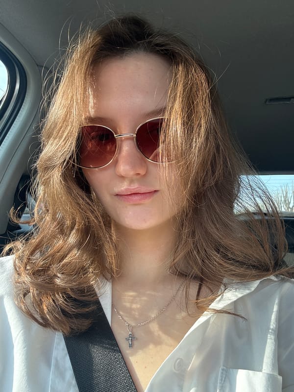 Woman in white shirt observed in vehicle in Perm