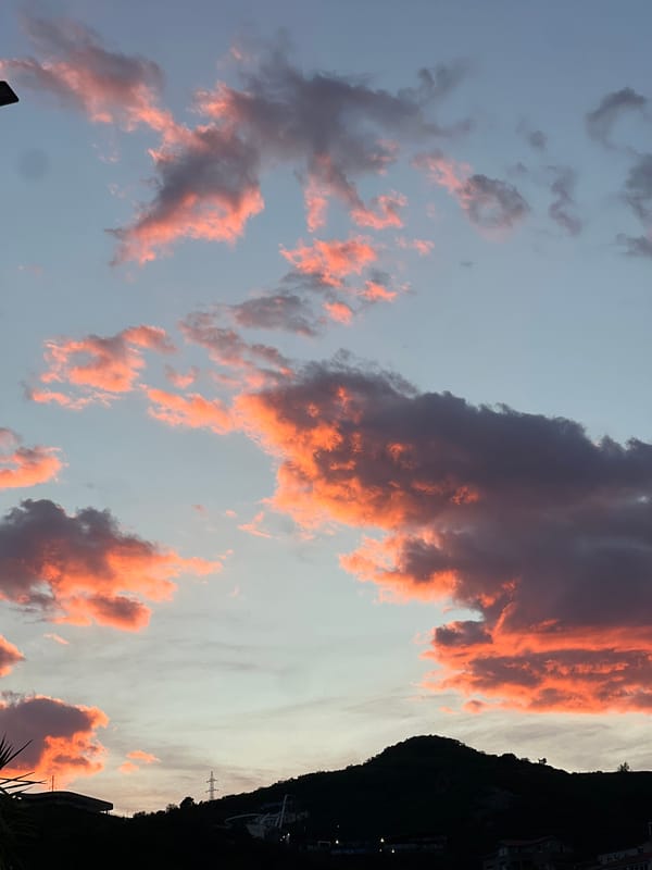 Sunset documentation across Budva includes urban views and personal moments