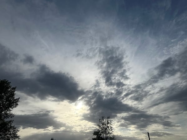 Mixed cloud formations observed over Chaikovsky, Russia