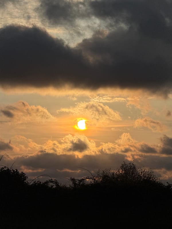 Dramatic sunset observed through storm clouds in Great Yarmouth