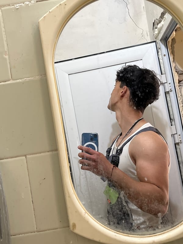 Person takes mirror selfie in Vratsa bathroom
