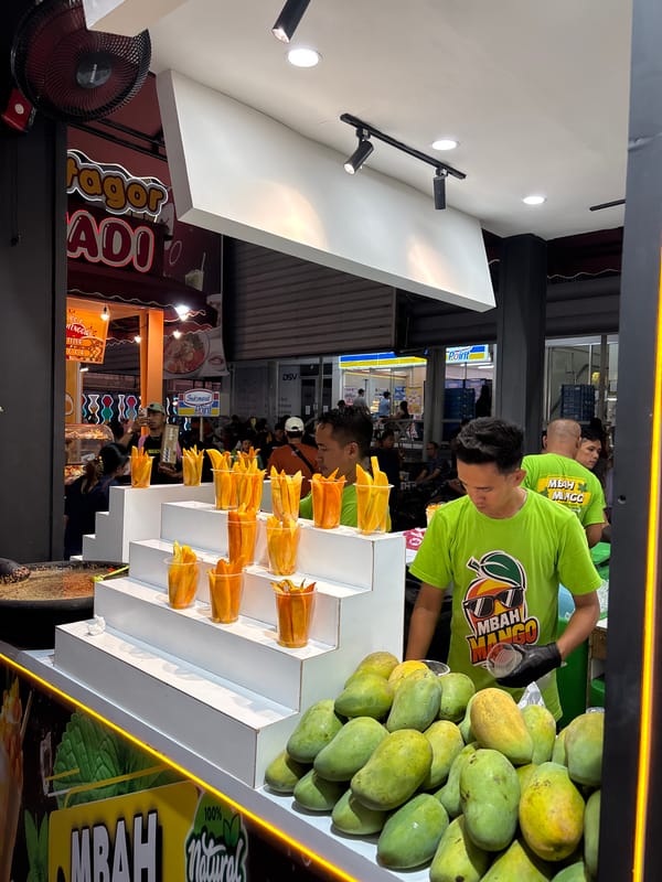 Night markets and indoor expos across Jakarta on a June evening