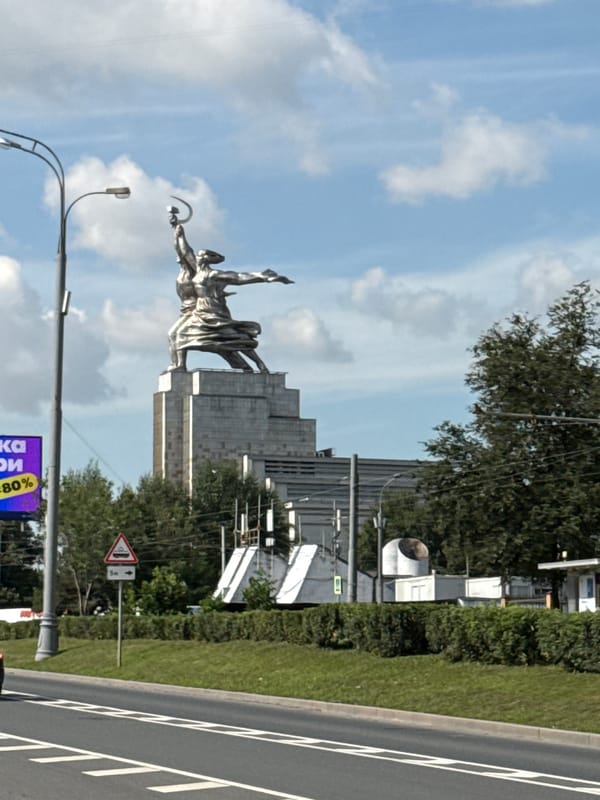 Soviet monument towers over Moscow skyline on a cloudy day