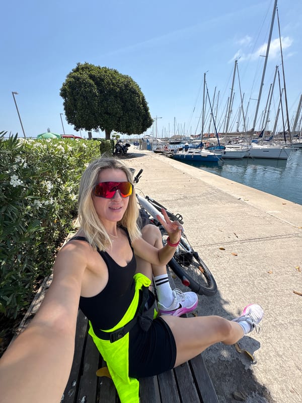 Bikes and sailboats on a sunny Valencia marina morning