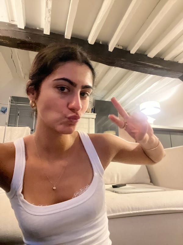 Woman takes food selfies during Paris dinner
