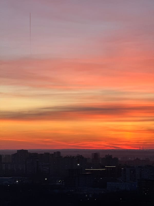 Dramatic sunset illuminates Perm cityscape at twilight