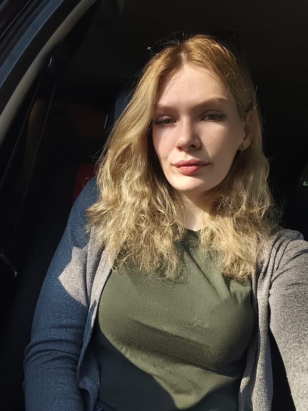 Woman in car, cats outdoors documented in Izhevsk