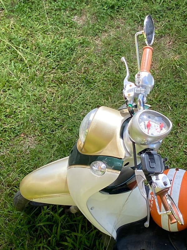 Morning moments: vintage scooter, digital devices, work diary tag