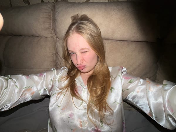 Woman relaxes at home in Penza, Russia evening