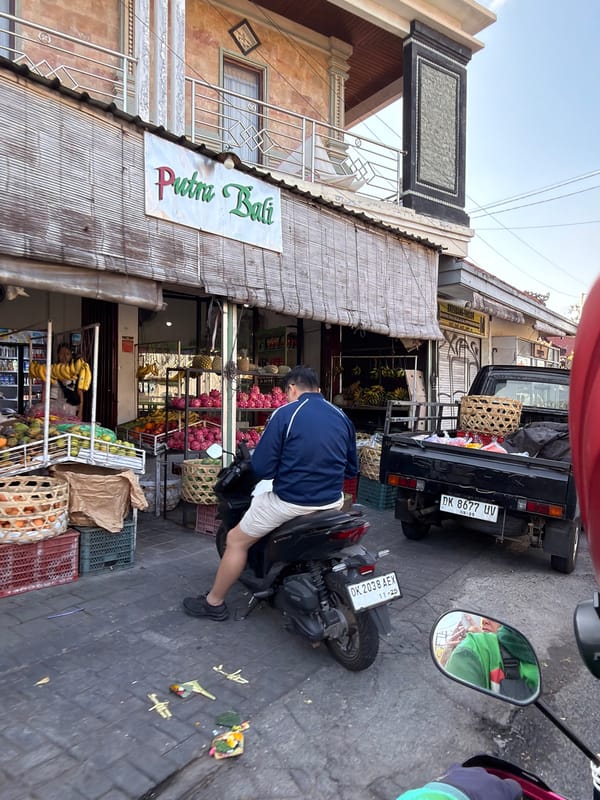 Tourist documents boutique shopping experience in North Kuta, Indonesia
